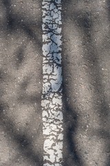 Asphalt highway texture with cracked stripe
