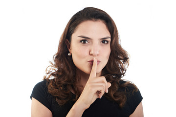Naklejka premium young woman with finger to lips