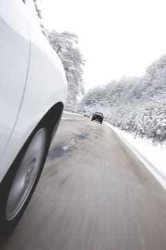 Car on a road with snow