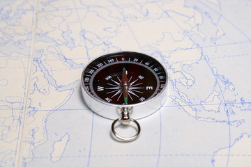 Fototapeta na wymiar compass on the map