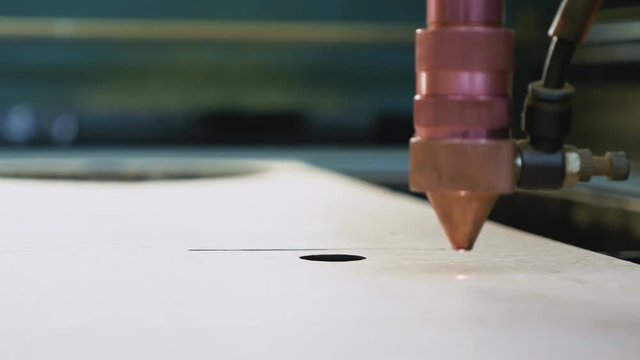 Laser cutting machine at work, close up