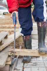 man sawing board