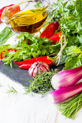 Fresh herbs, oil and seasoning. healthy food concept