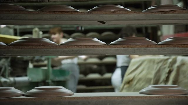 Production line of plates. .Forming is the production of gypsum forms- designed only for dishes, having round features plates, cups, bowls, saucers.