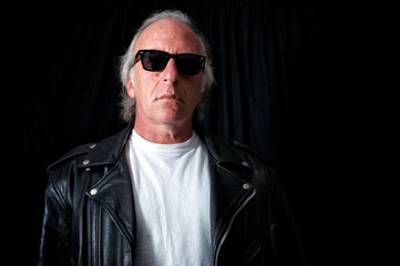 older grey haired biker