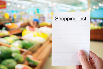 hand hold shopping list in Supermarket