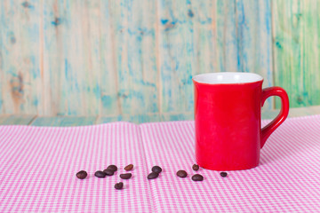 coffee beans  with red cup