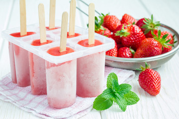 Homemade popsicles with strawberry
