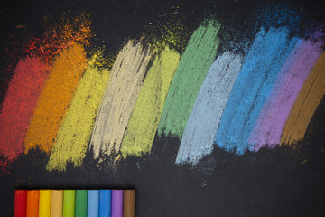 color chalks on gray paper