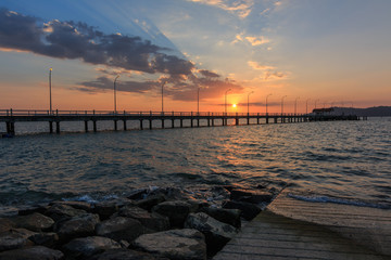 Beautiful Sunset with long Jetty in horrizon