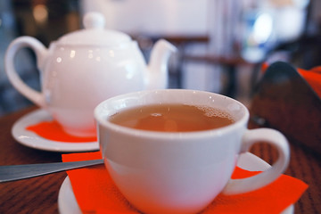 teapot and cup of tea at a cafe