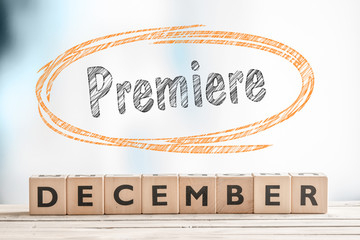 December premiere sign on a stage
