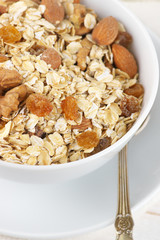 Oatmeal flakes with nuts in bowl