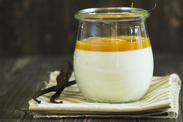 Vanilla panna cotta with fruits sauce