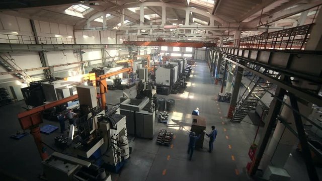 Timelapse of workers in industrial factory. HD