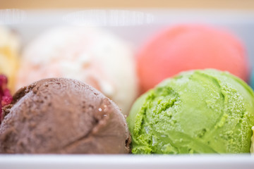 selective focus on chocolate and green tea ice cream