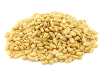 pine nuts on a white background