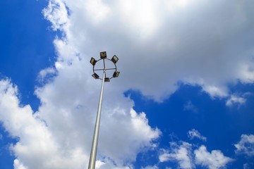 Lamppost with four lamps over on the sky