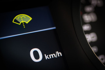 Window washer fluid symbol in a car