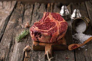 Raw fresh meat Ribeye Steak with  pepper and salt