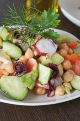 Healthy salad with Octopus and vegetables