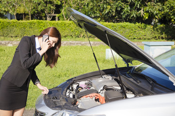 stress business woman calling for help with  car broken concept