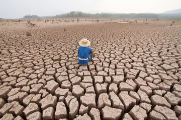 Fotobehang Man and Climate change © piyaset