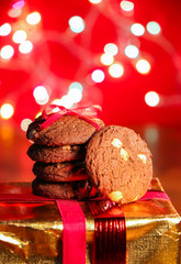 Cookies on wooden table with christmas bokeh background