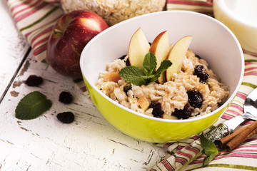 Oatmeal porridge with berries and fruits