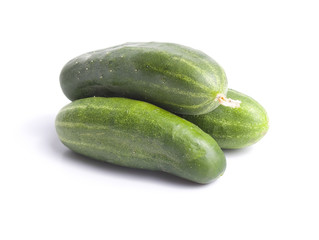 Green cucumber on white