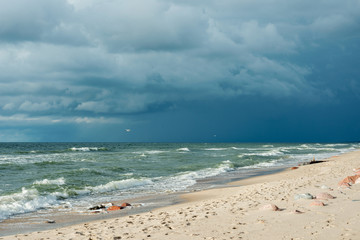 Landscape stormy sea at sunset