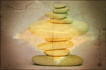 Yellow grunge effect applied to stacked stones
