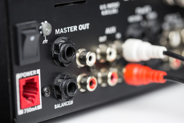 Rca cables on back panel of dj mixer