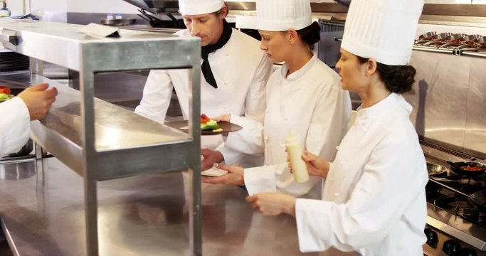 Team of chefs preparing food