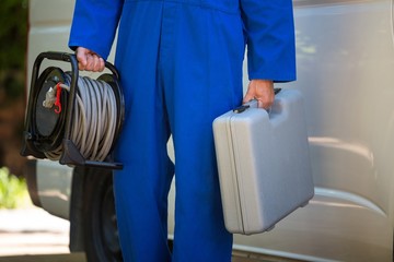 Mechanic with a tool box