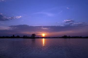 Blue sky during sunset over the lake