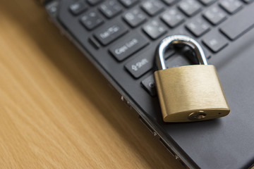 security lock on computer - computer security concept - selective focus