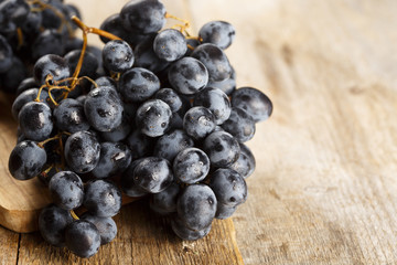 Grapes on wooden background
