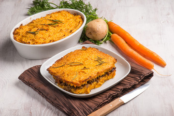 cake with potatoes carrots and minced meat
