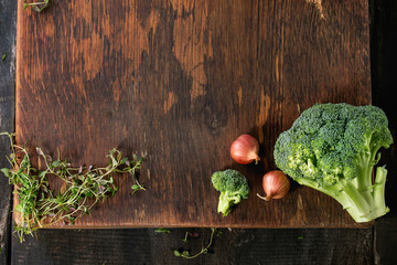 Wooden background with vegetables