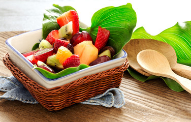 fresh fruits salad with decorative calla leaf
