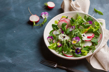 Spring salad with edible flower