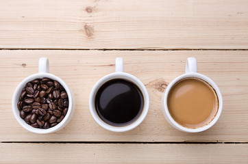 Coffee. Cups with coffee. Coffee beans .