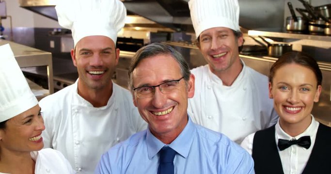 Portrait of smiling chefs