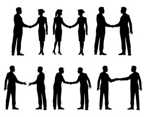 Businessmen handshake silhouettes