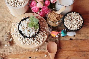 Cooked millet seeds with milk and sugar.