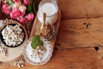 Cooked millet seeds with milk and sugar.