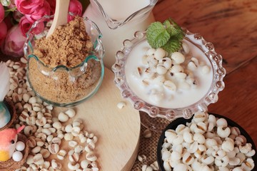 Cooked millet seeds with milk and sugar.