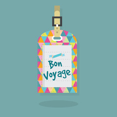 Abstract Bon Voyage message on luggage and travel tag