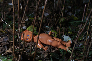 Scary doll. Child abuse. Crime scene